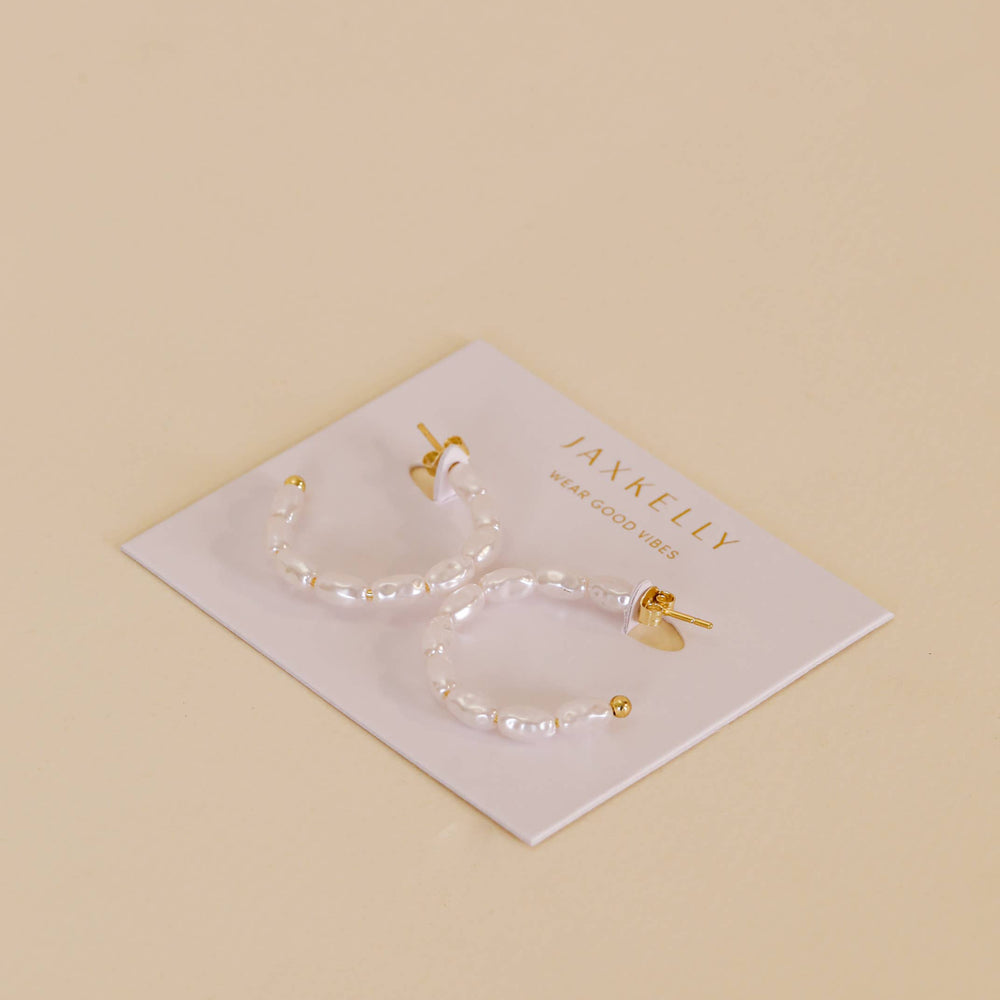 
                      
                        Multi Pearl Hoop Earrings
                      
                    