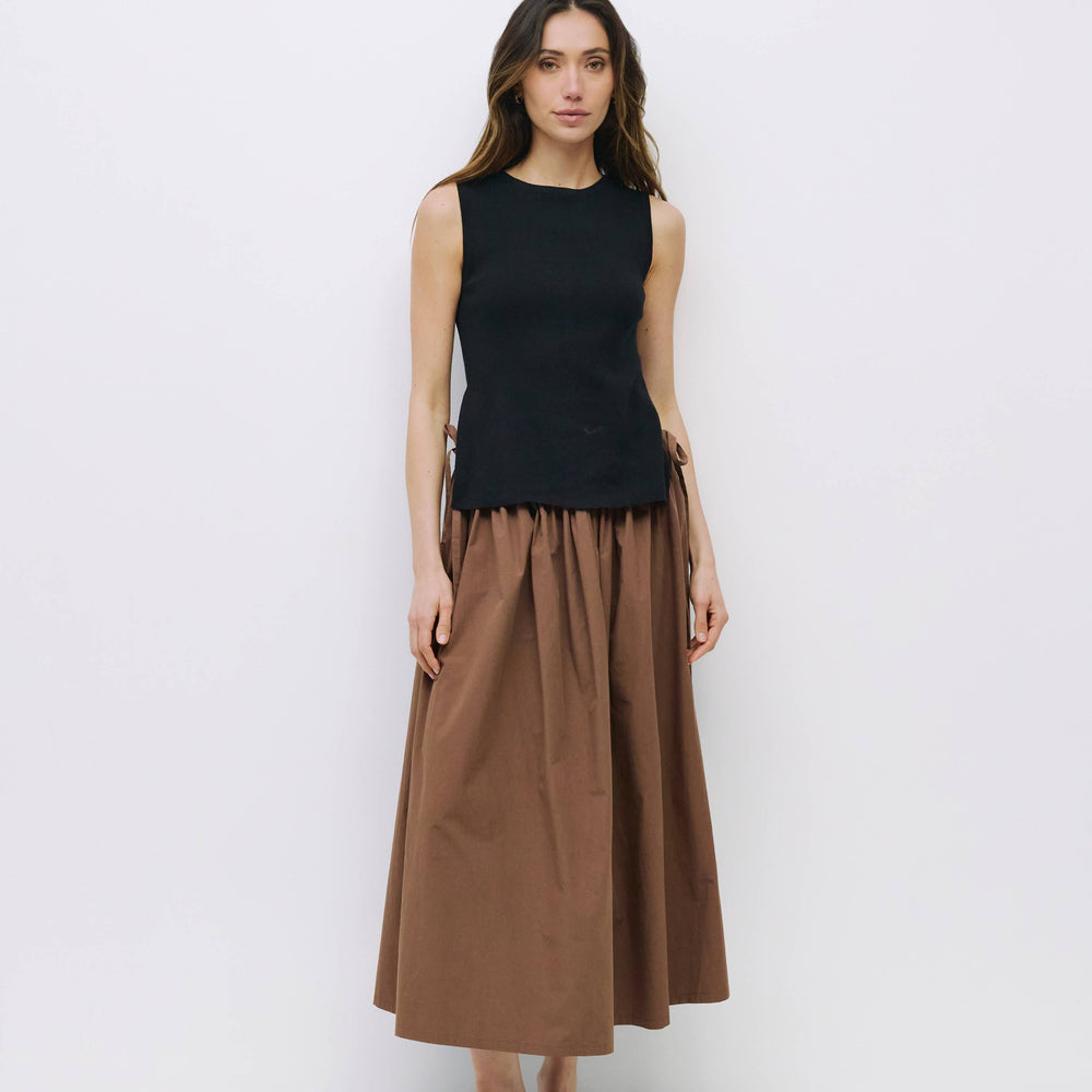 
                      
                        The Kiana Midi Skirt with Side Waist Ties
                      
                    