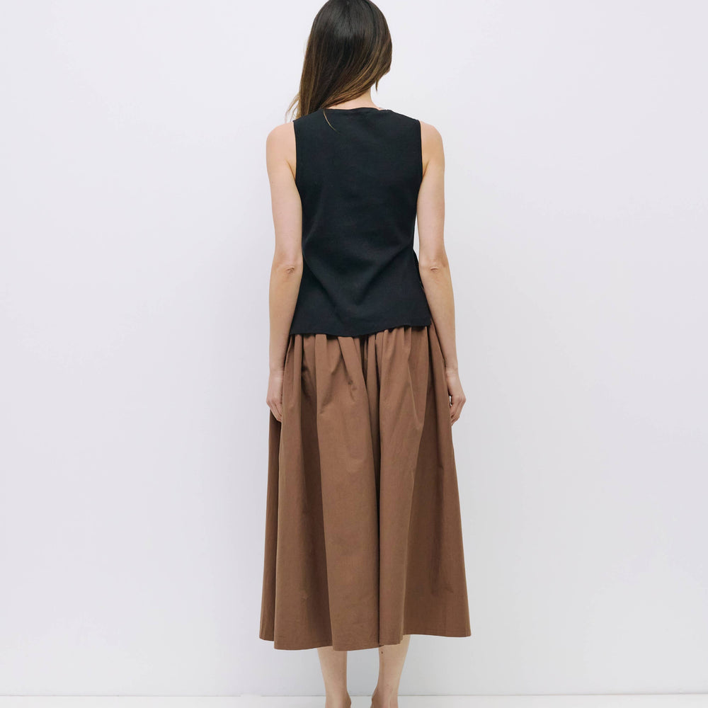 
                      
                        The Kiana Midi Skirt with Side Waist Ties
                      
                    