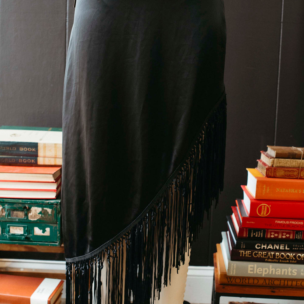 
                      
                        Pre-loved Black Asymmetrical Fringe Skirt - Size M
                      
                    