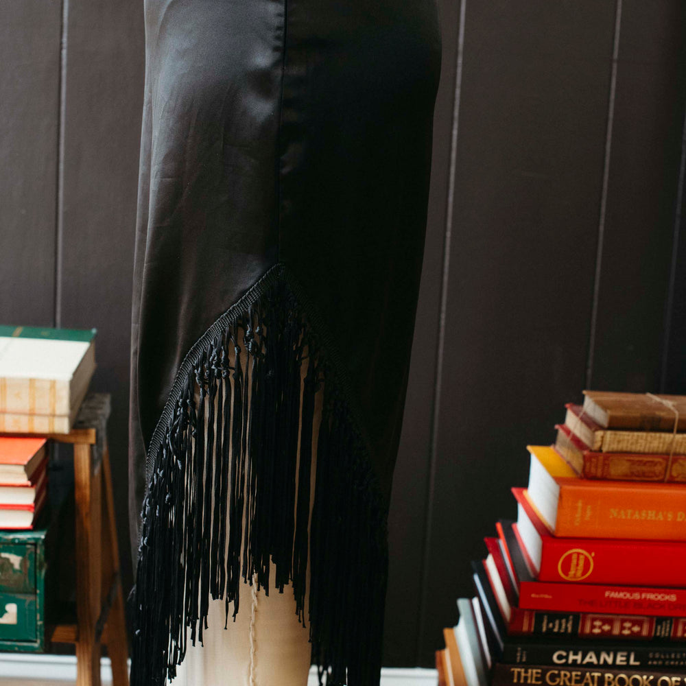 
                      
                        Pre-loved Black Asymmetrical Fringe Skirt - Size M
                      
                    