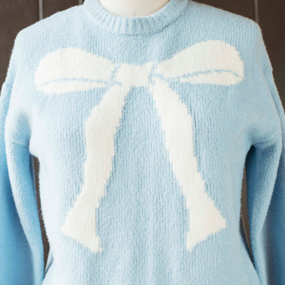 
                      
                        Pre-loved Powder Blue Bow Sweater - Size M
                      
                    