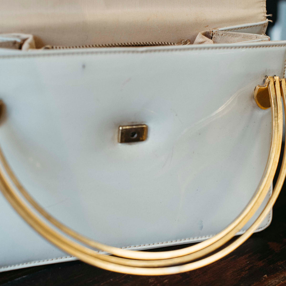 
                      
                        Vintage Cream & Gold Purse
                      
                    