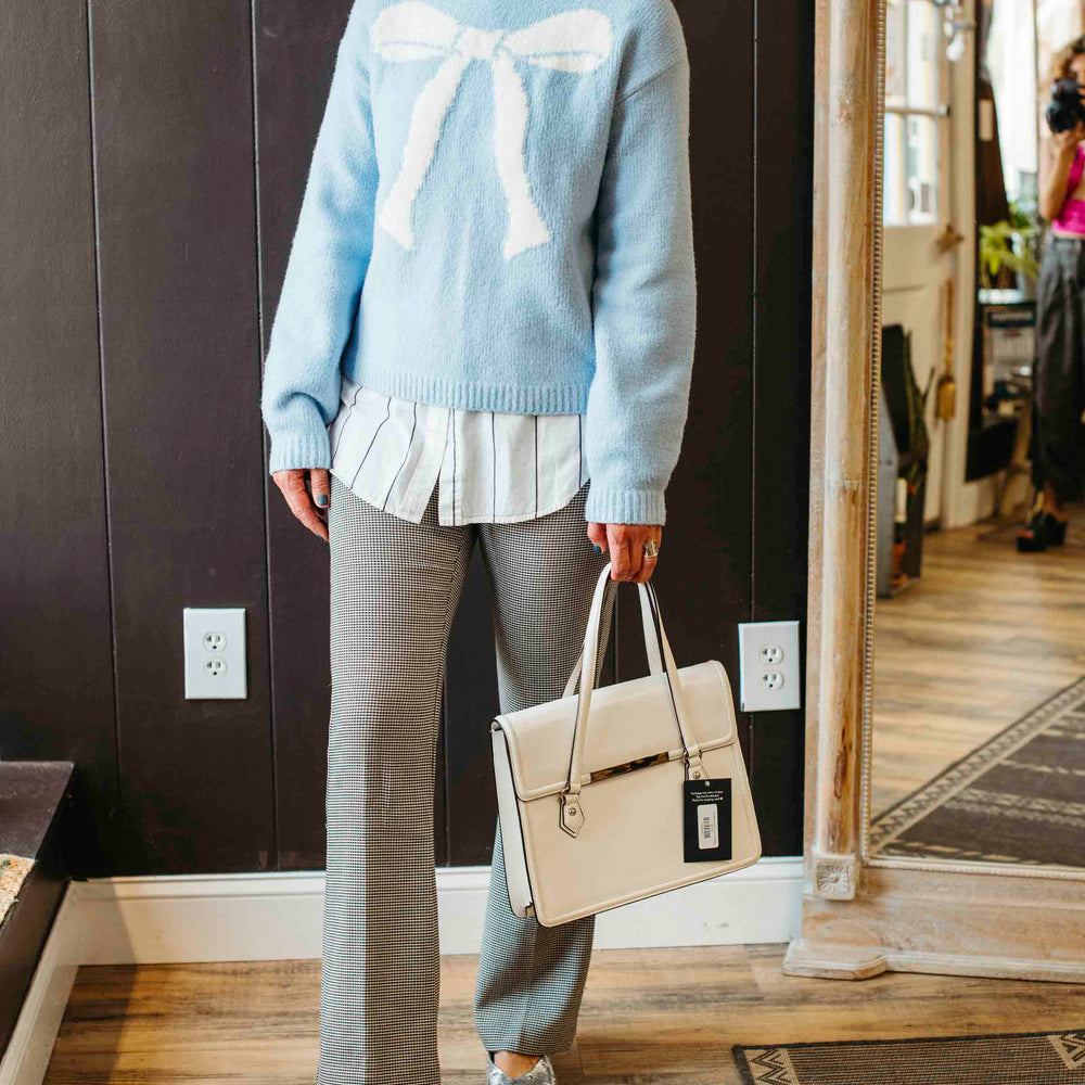 
                      
                        Pre-loved Powder Blue Bow Sweater - Size M
                      
                    