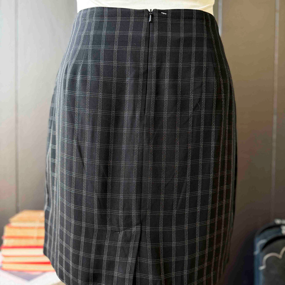 
                      
                        Pre-loved Black Check Mini Skirt - Size L
                      
                    