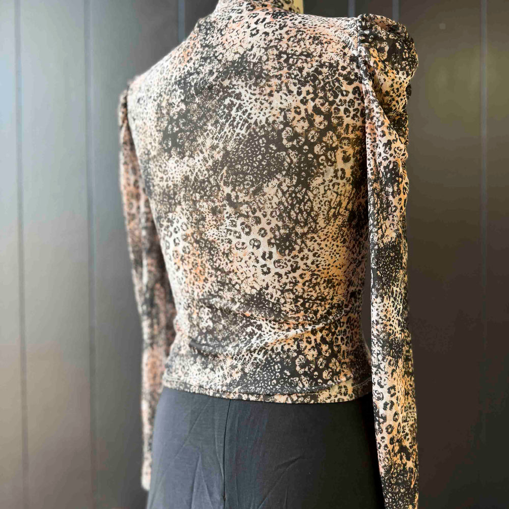 
                      
                        Pre-loved Multi Animal Print Puff Shoulder Blouse - Size S
                      
                    