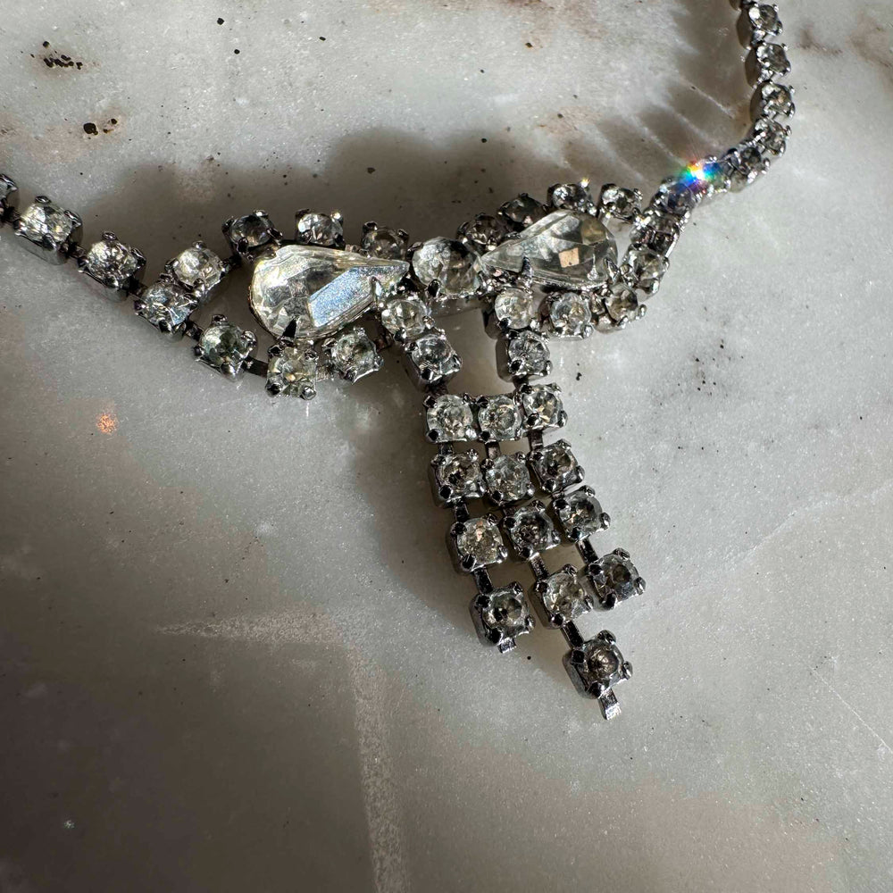 
                      
                        Vintage Rhinestone Bow Necklace
                      
                    
