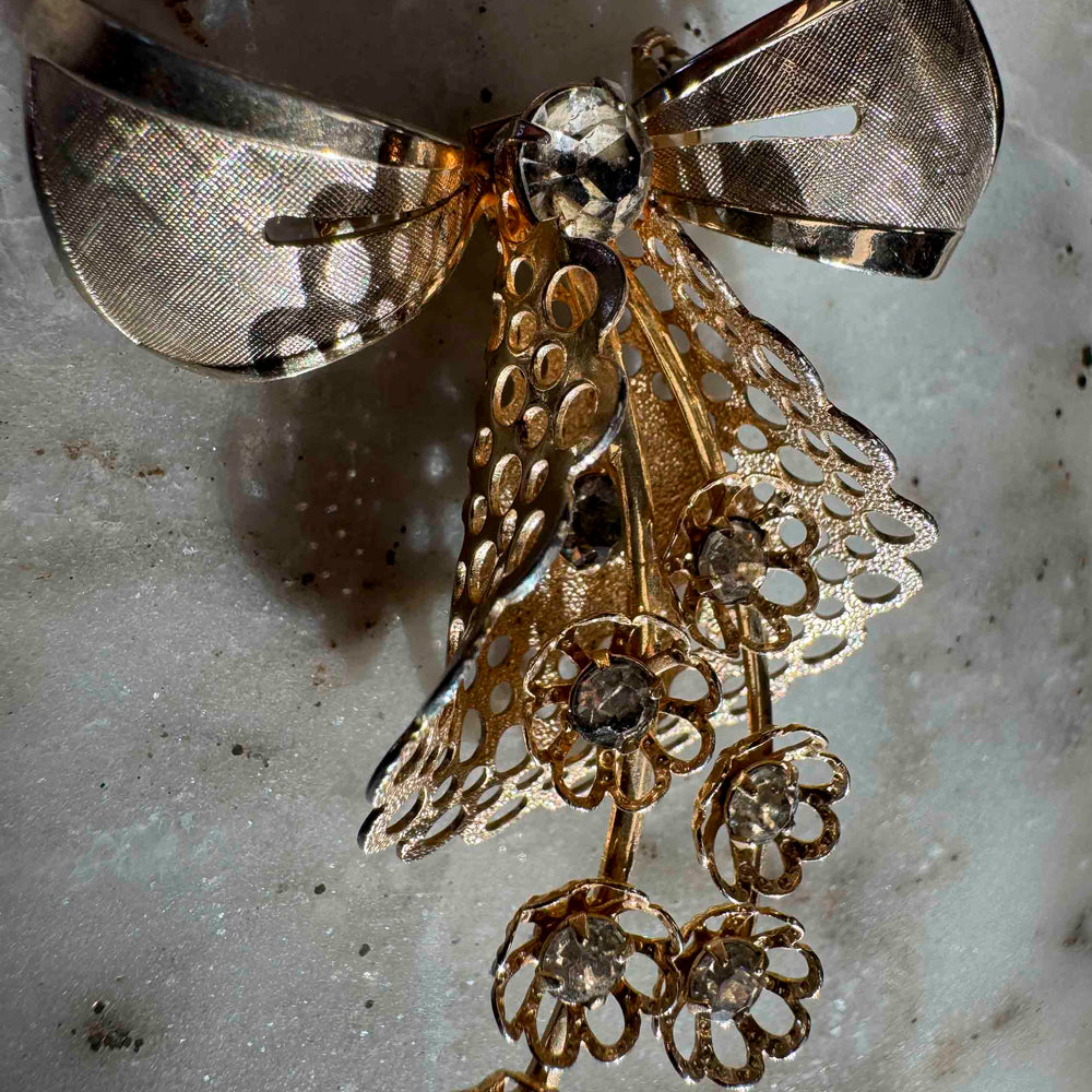 
                      
                        Vintage Rhinestone Bow Brooch
                      
                    