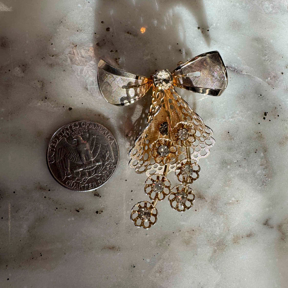 
                      
                        Vintage Rhinestone Bow Brooch
                      
                    