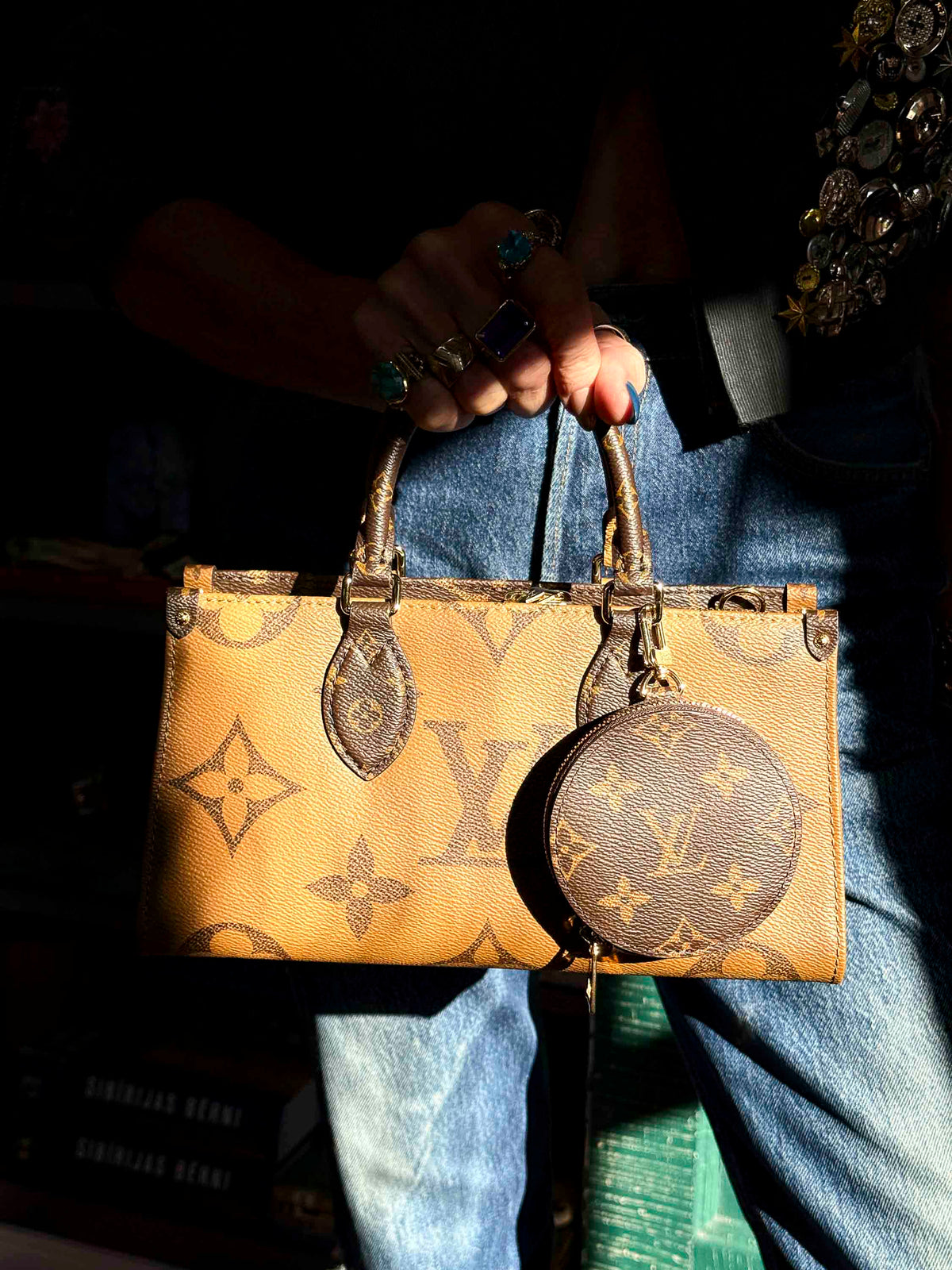 Pre-Loved Louis Vuitton Onthego East West Leather Handbag
