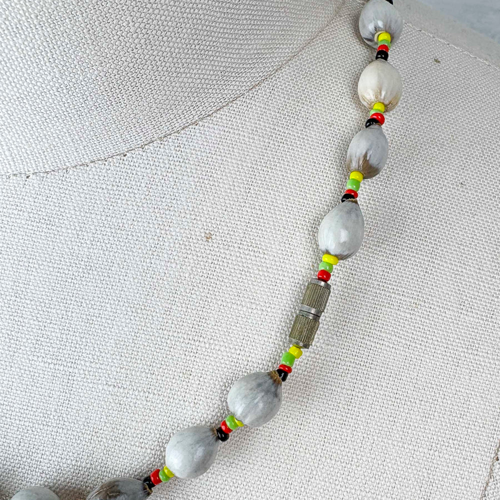 
                      
                        Vintage Rasta Shell Necklace
                      
                    