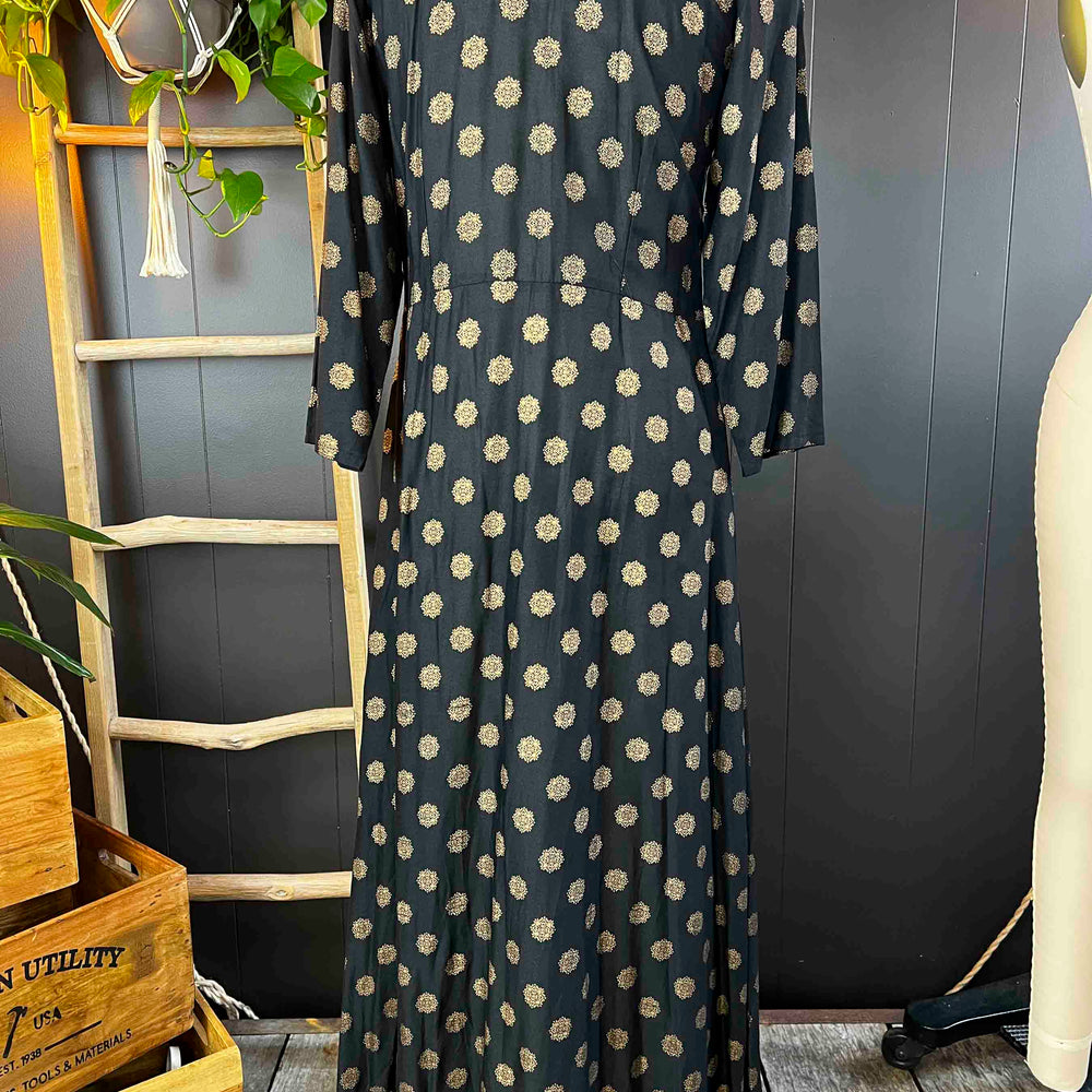 
                      
                        Pre-Loved Black Cotton Long Sleeve Maxi Dress with Gold Patterns - Size L
                      
                    