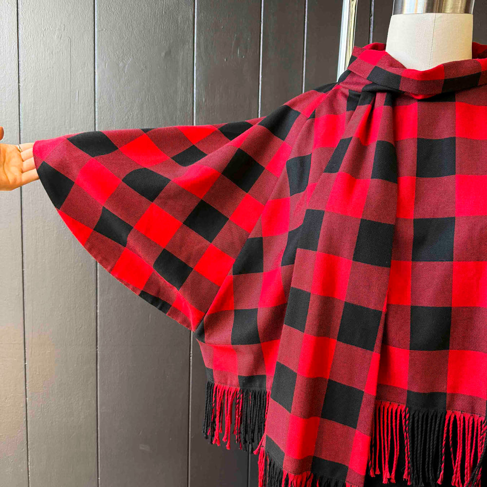 
                      
                        Pre-loved Red & Black Check Cape - Size M
                      
                    
