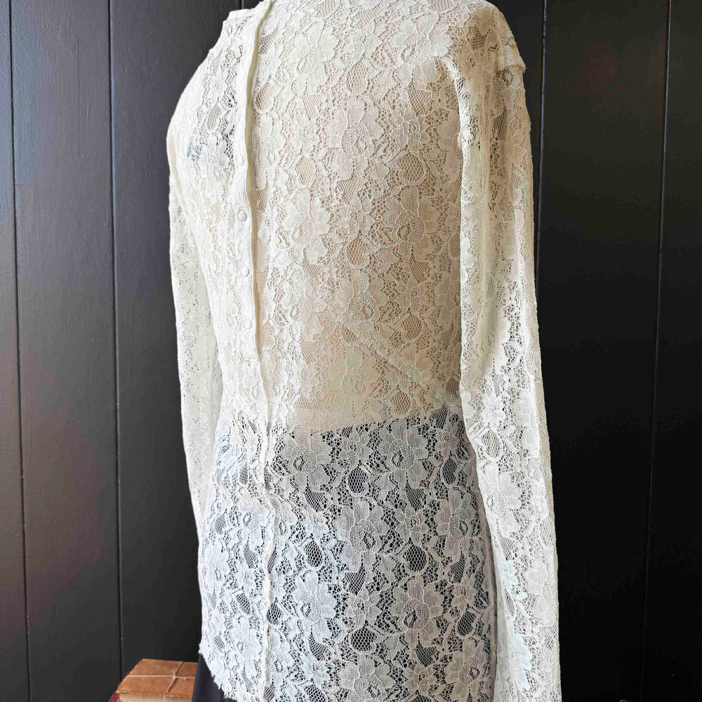
                      
                        Pre-loved Sandro Paris White Lace Snap Back Blouse - Size M
                      
                    