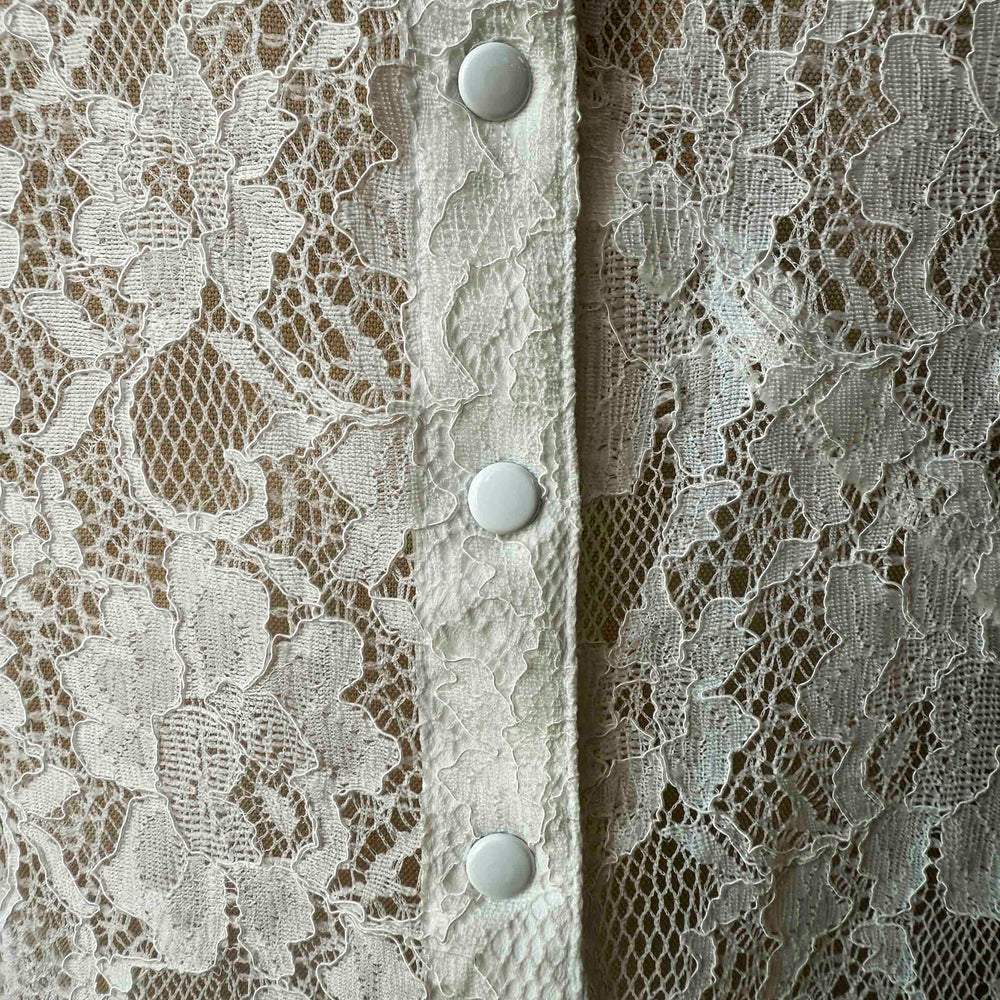 
                      
                        Pre-loved Sandro Paris White Lace Snap Back Blouse - Size M
                      
                    