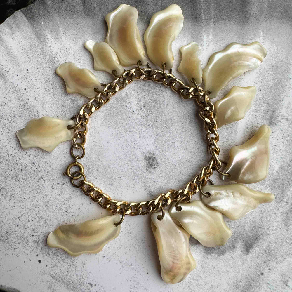 
                      
                        Vintage Mother of Pearl Fringe Bracelet
                      
                    