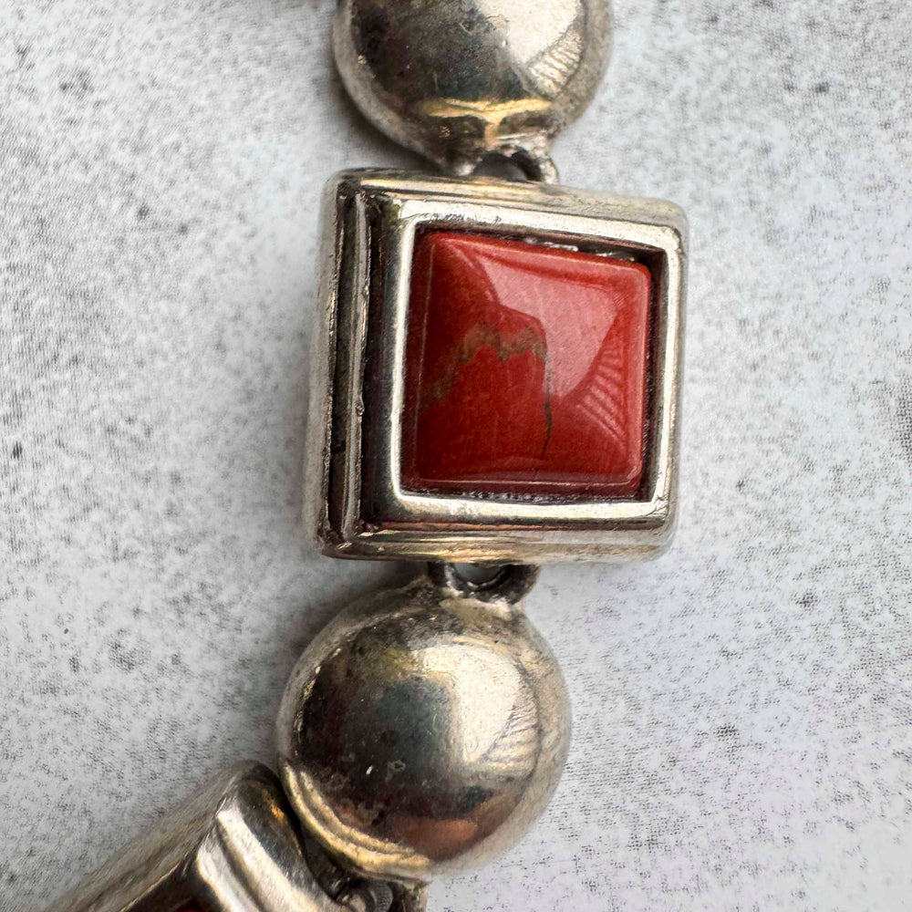 
                      
                        Vintage Sterling Silver & Red Coral Panel Bracelet
                      
                    