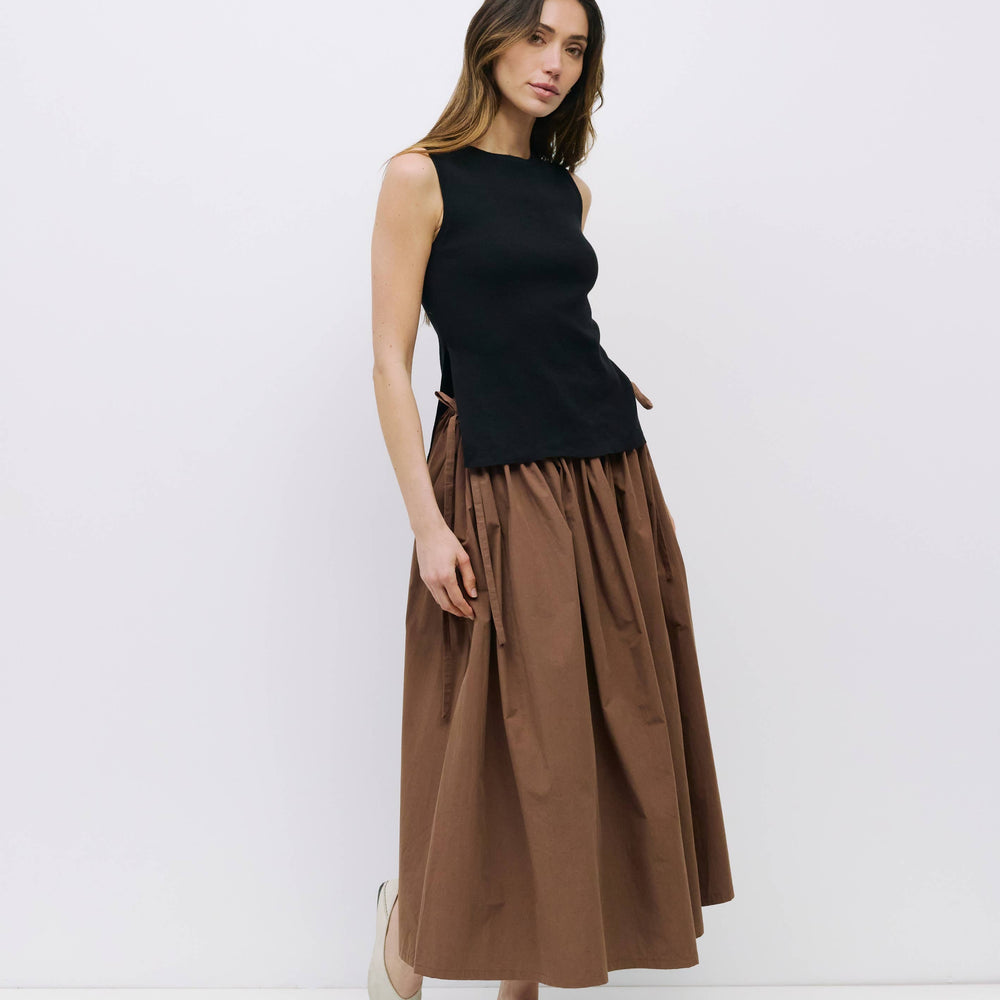 
                      
                        The Kiana Midi Skirt with Side Waist Ties
                      
                    