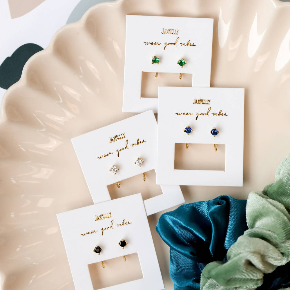 
                      
                        CZ Huggies - Sapphire - Gold Earrings
                      
                    