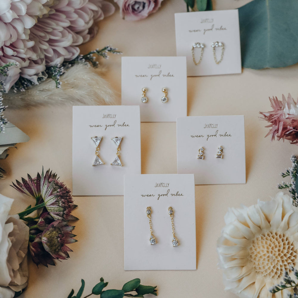 
                      
                        Dual Triangle Drop - Gold Earrings
                      
                    
