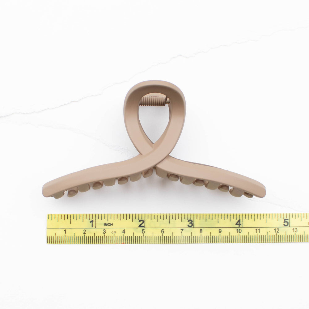 
                      
                        4.5 Inch Original French Twist Acrylic Hair Claw Clip
                      
                    