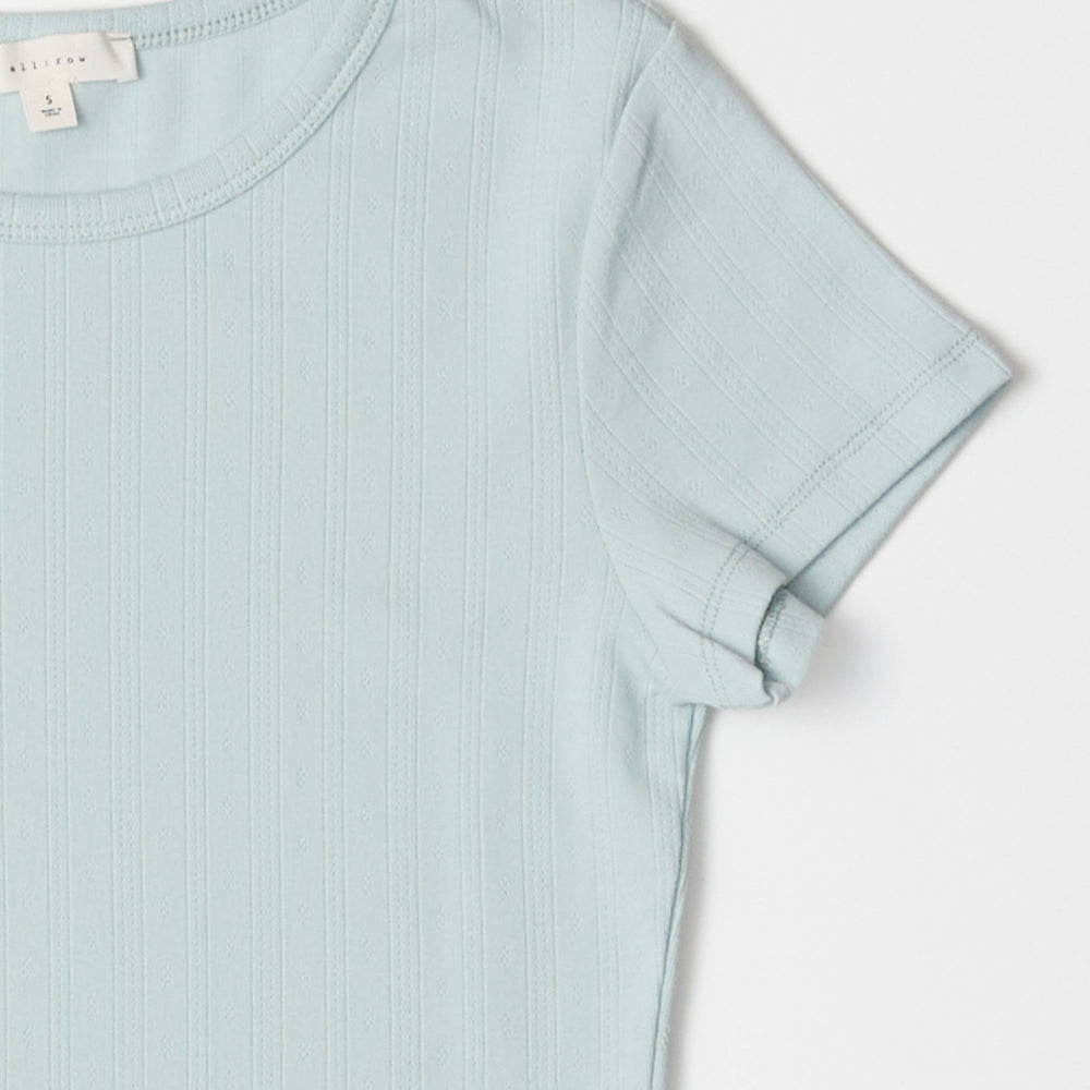 
                      
                        The Deborah Baby Tee in Sage
                      
                    