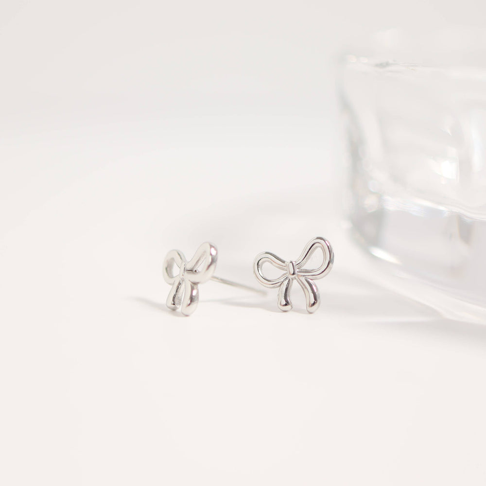 
                      
                        Bow Stud Earrings
                      
                    