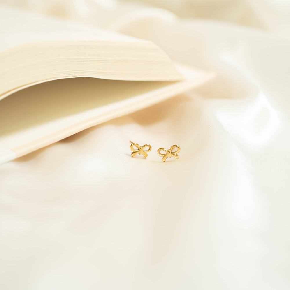 
                      
                        Bow Stud Earrings
                      
                    