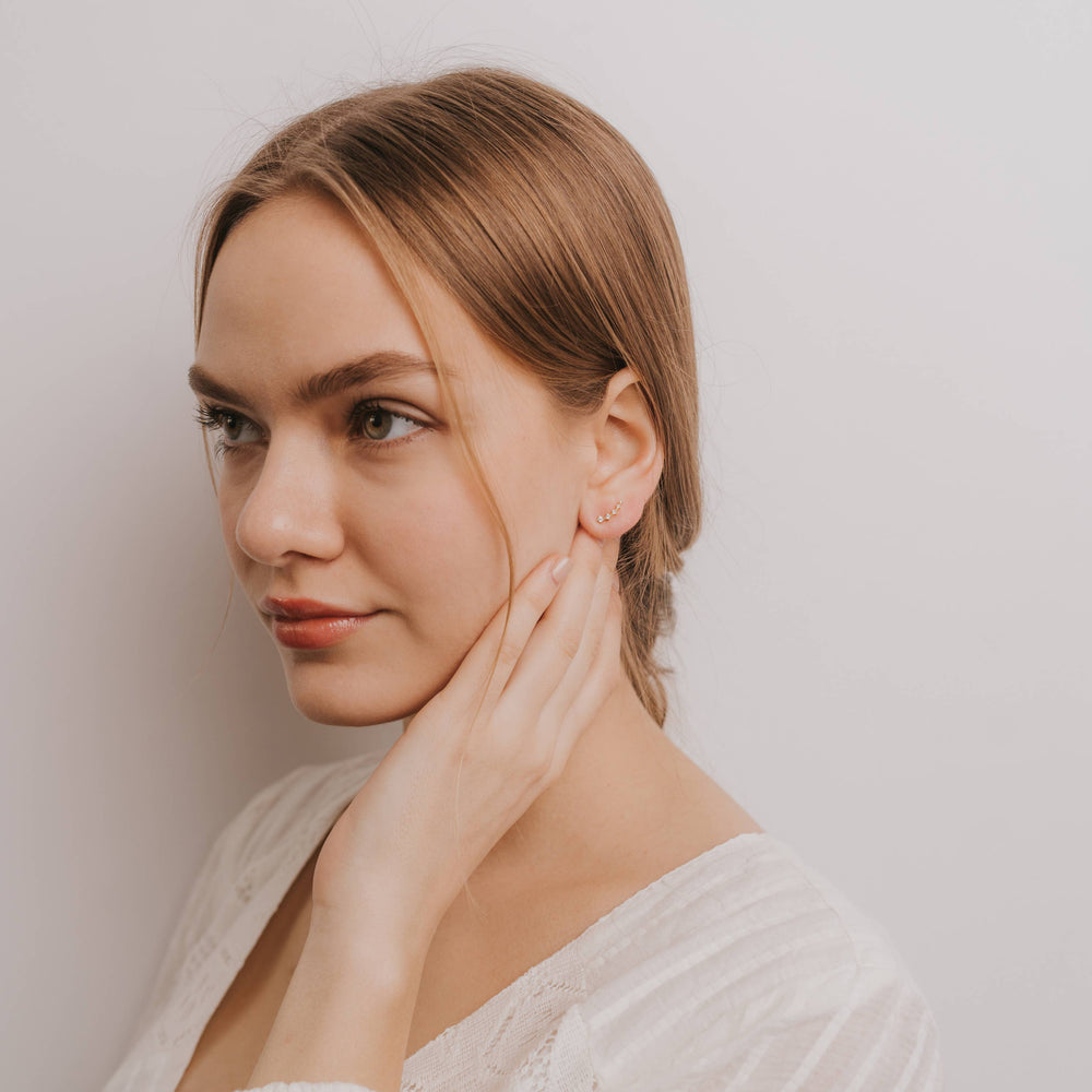 
                      
                        Crawler - White CZ - Gold Earrings
                      
                    